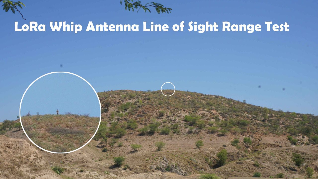 An image illustrating a line-of-sight range test using an Arduino and the AI-Thinker LoRa Ra-02 module with a whip antenna. The test measures the maximum distance at which the whip antenna, in combination with the Arduino and the Ra-02 module, can establish and maintain reliable LoRa communication in a direct line-of-sight environment.