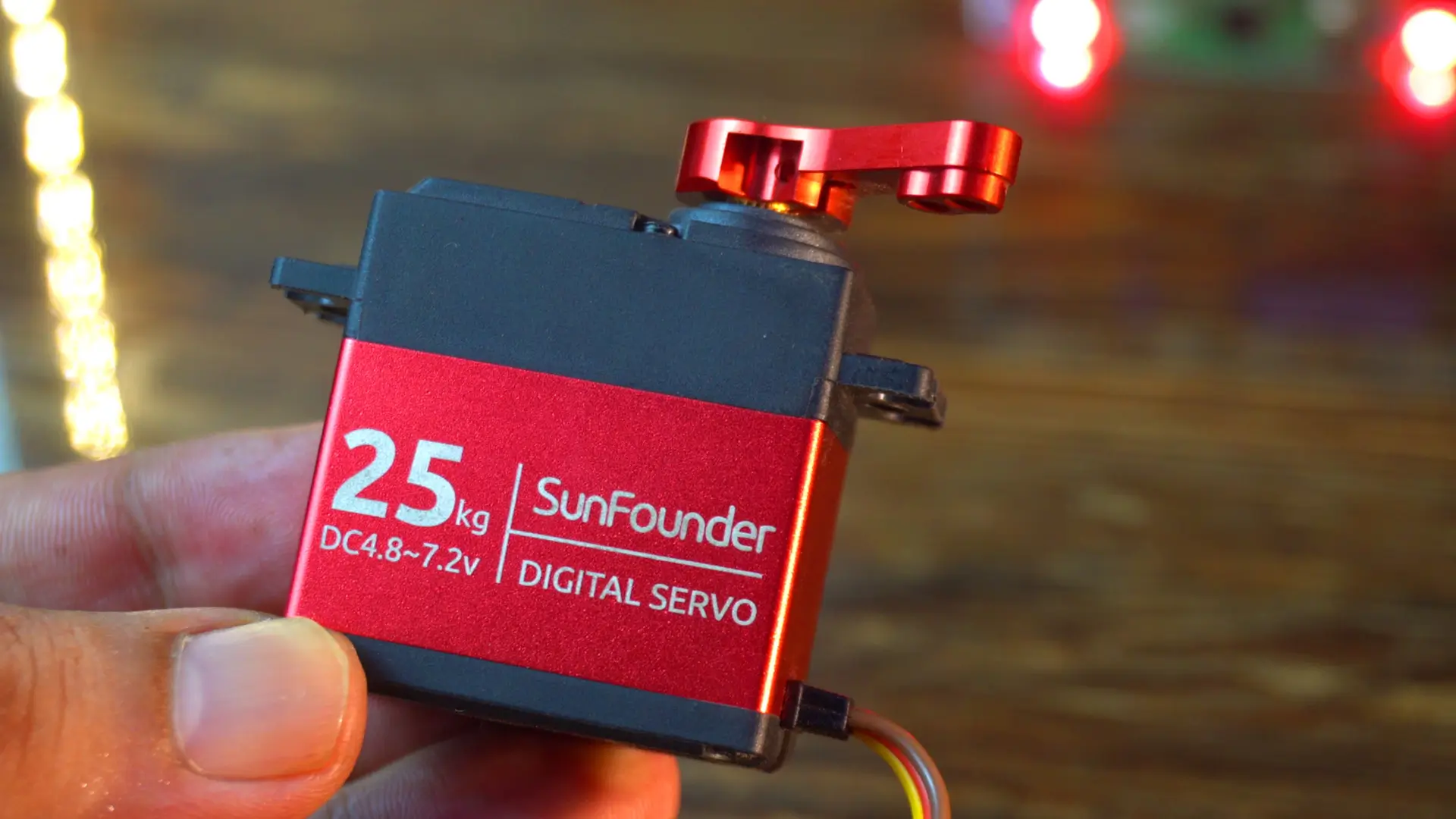 The ESP32S3 custom board easily drives this heavy-duty 25kg torque servo motor.