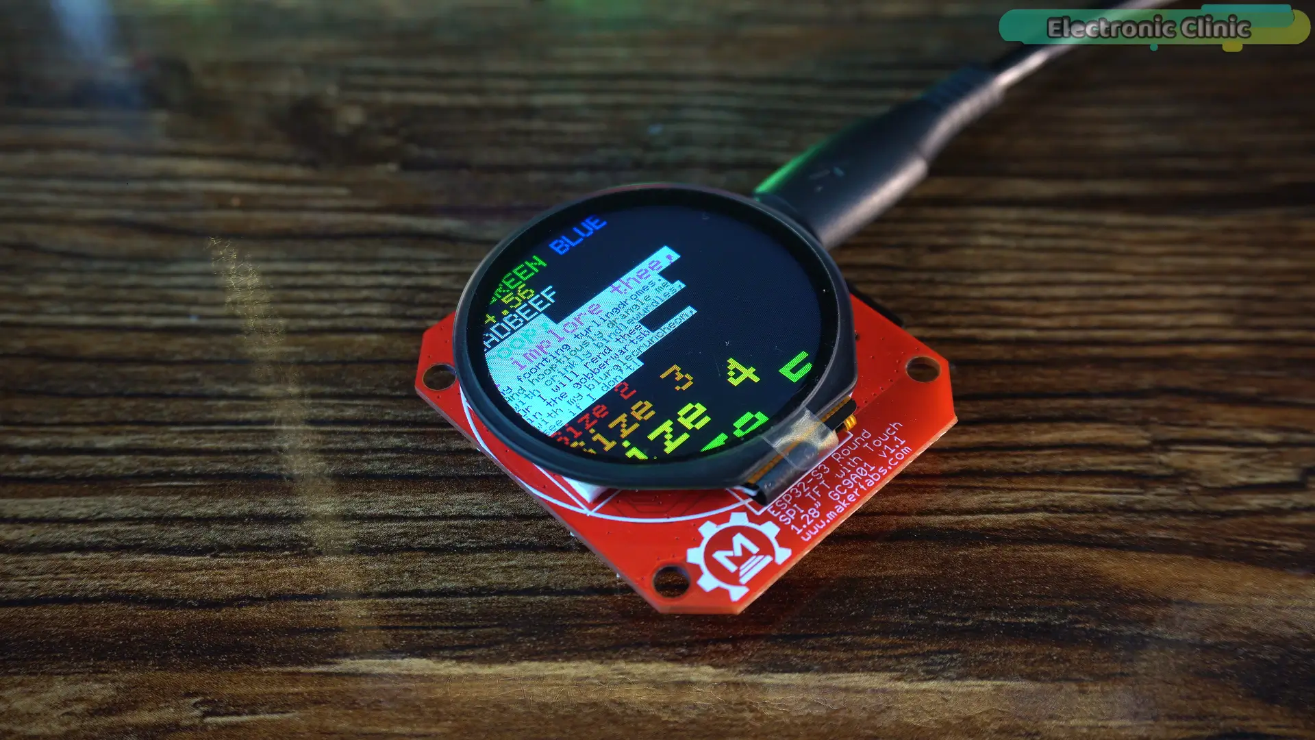 ESP32-S3 round touchscreen display running an LVGL interface