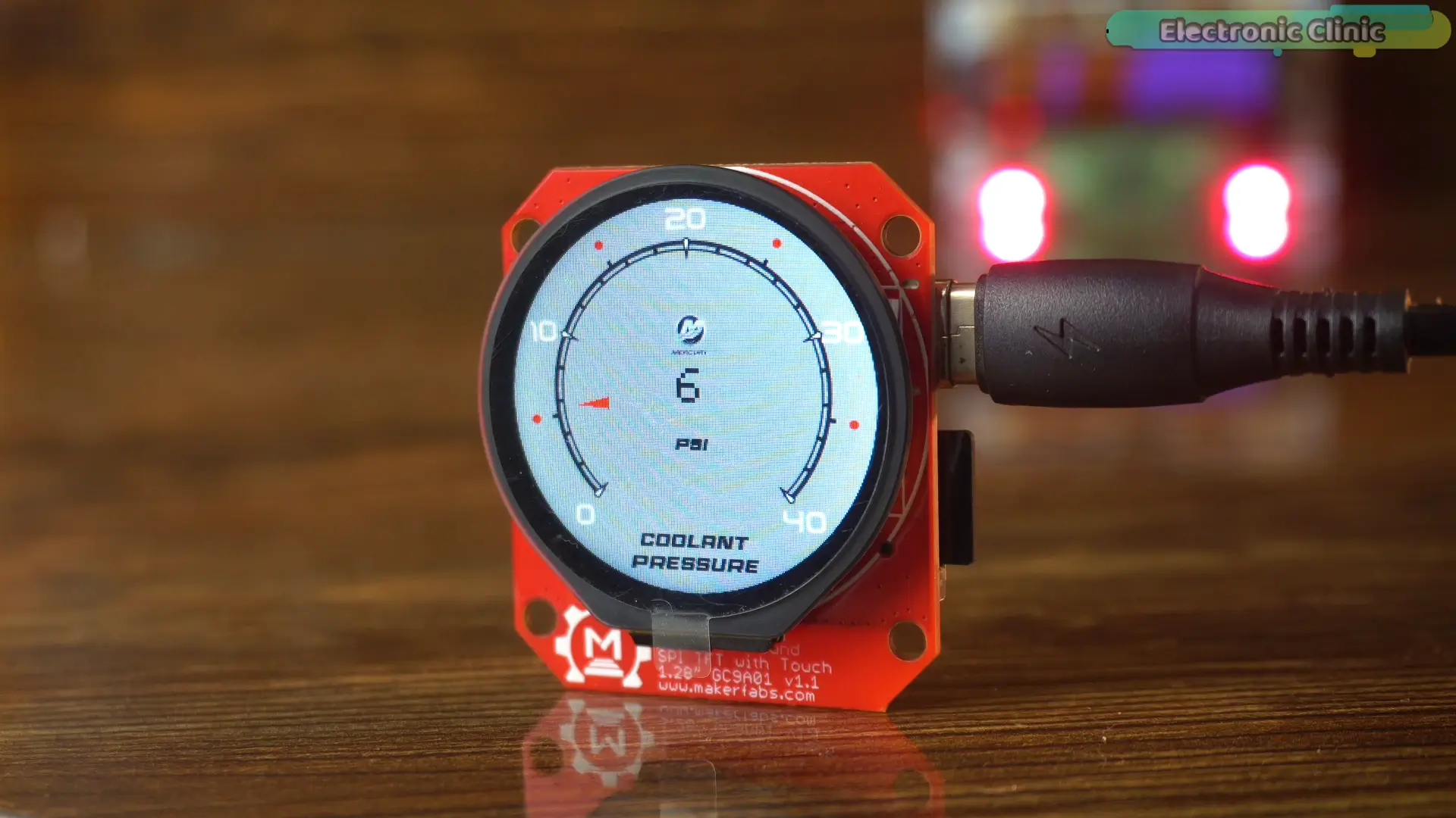 ESP32-S3 round touchscreen display running an LVGL interface