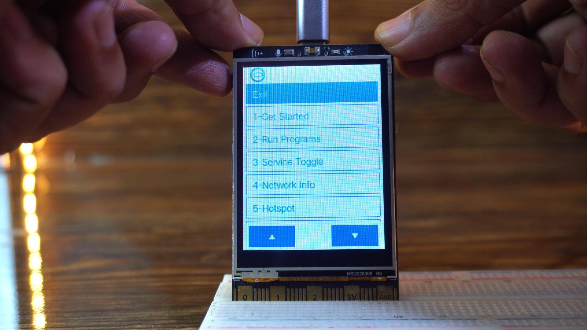 UNIHIKER M10 home menu showing the main options and settings on the touchscreen