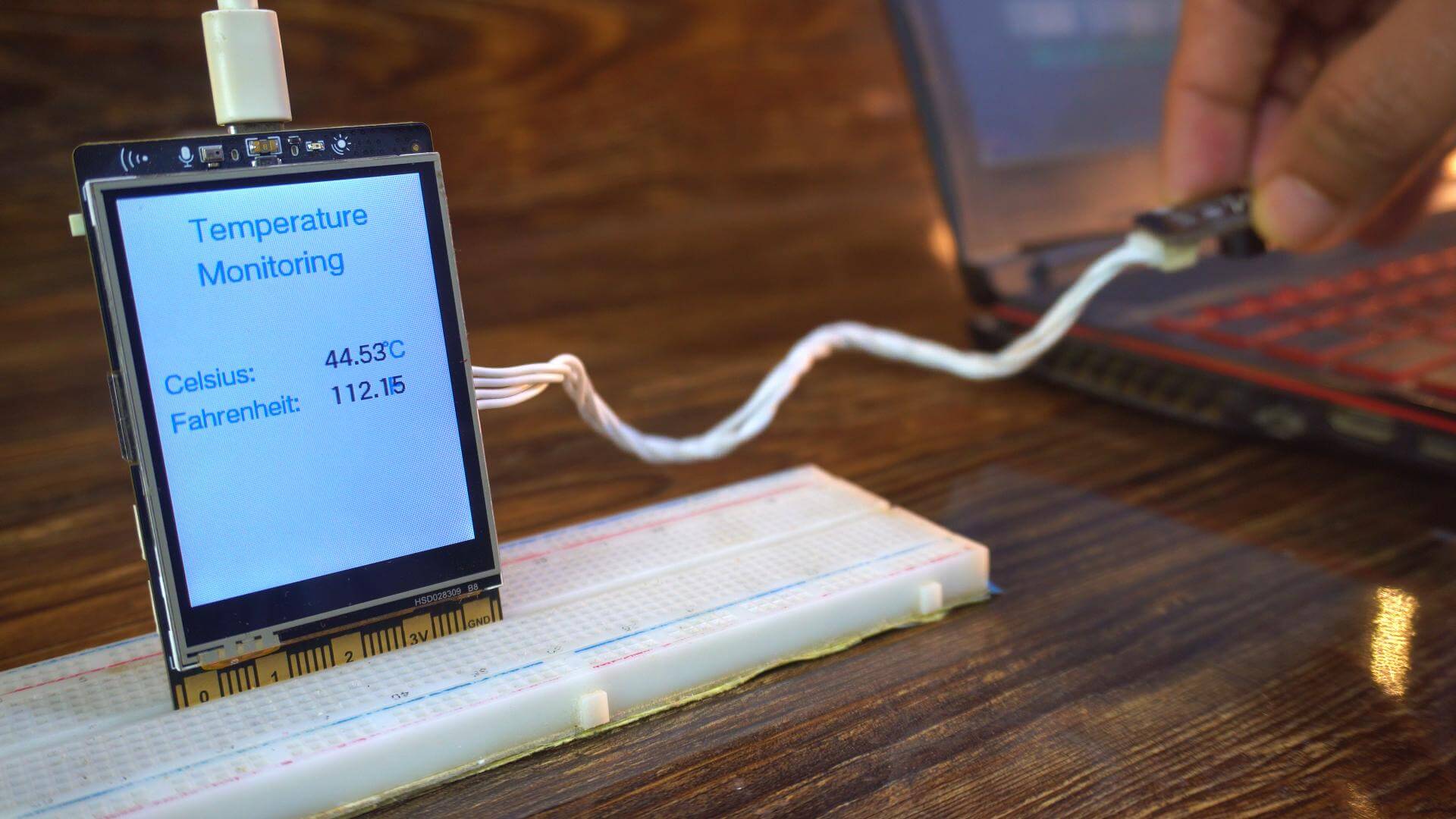 Infrared temperature sensor with UNIHIKER M10 Jupyter Notebook for contactless temperature monitoring