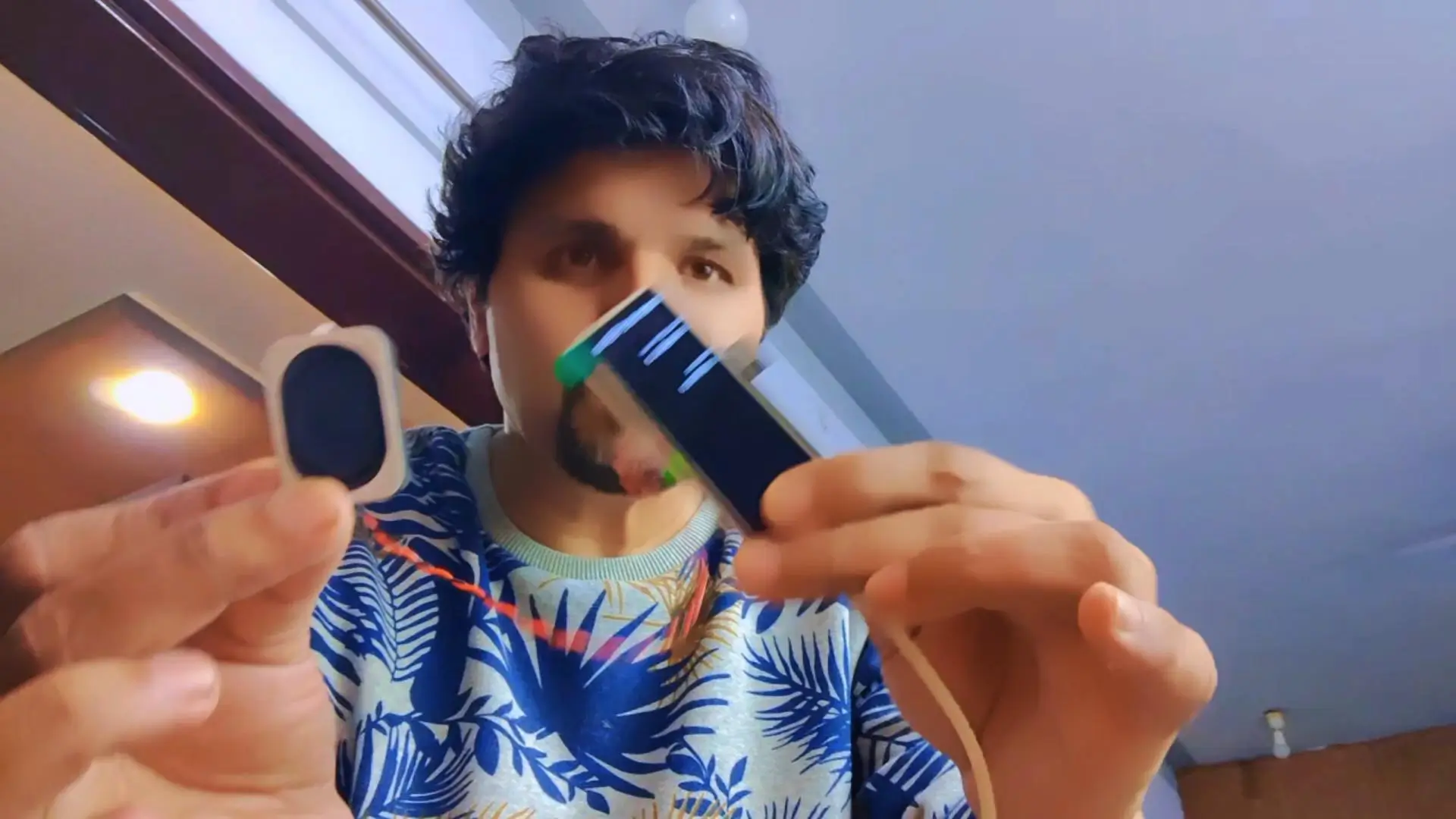 Left and right shake gestures to change songs on an ESP32-S3 music player
