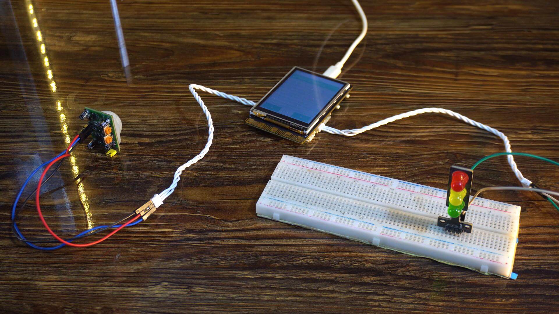Security system using a PIR motion sensor with UNIHIKER M10 and Jupyter Notebook