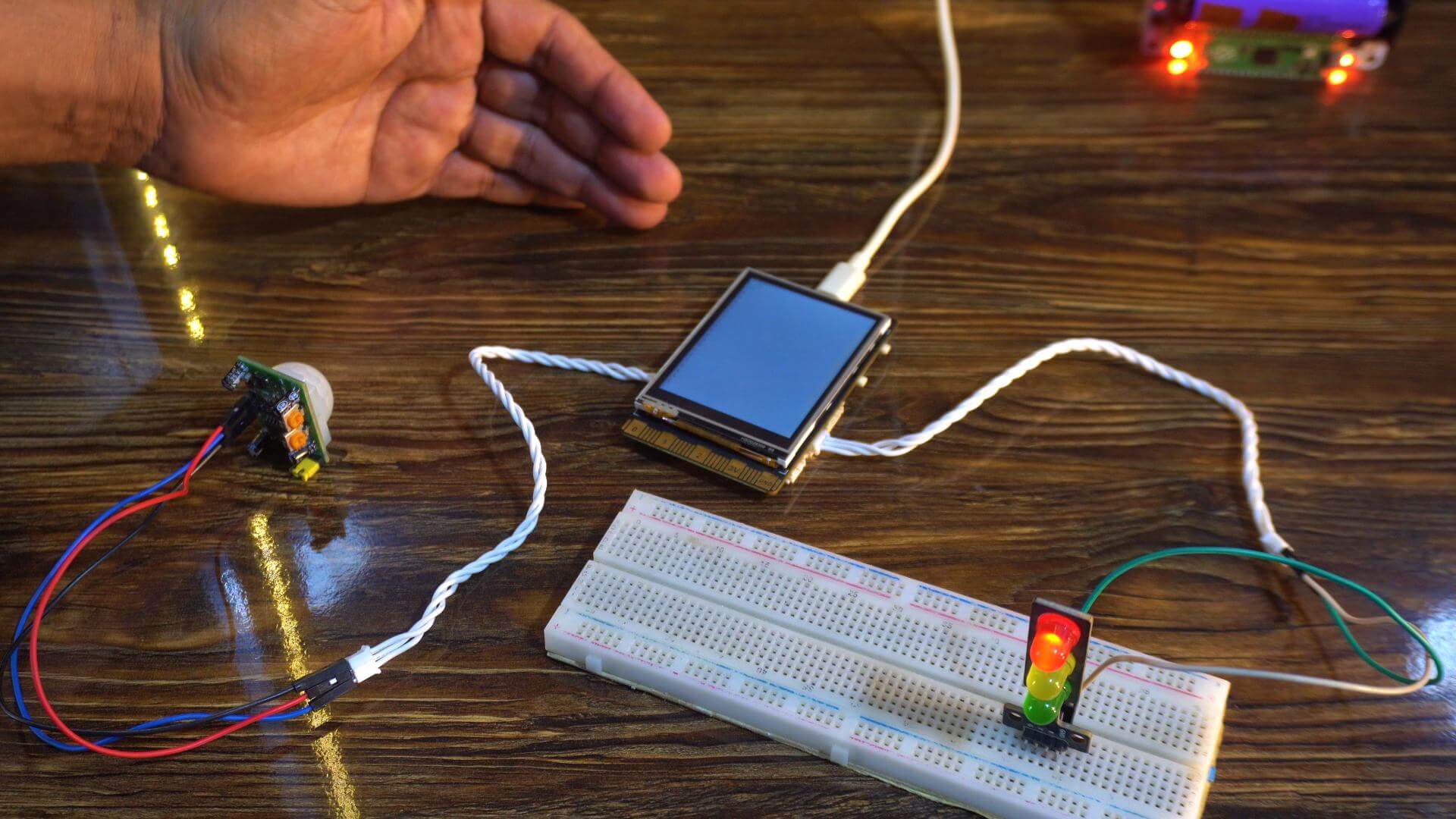 Security system using a PIR motion sensor with UNIHIKER M10 and Jupyter Notebook