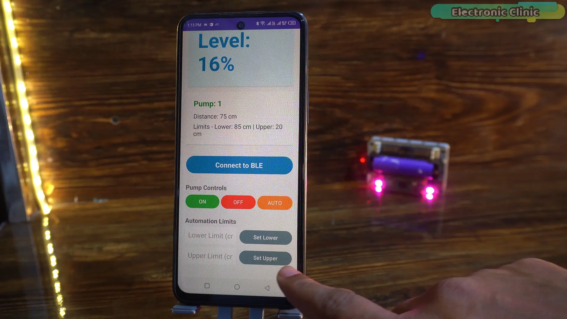 Pump control buttons in a cell phone app for water tank monitoring