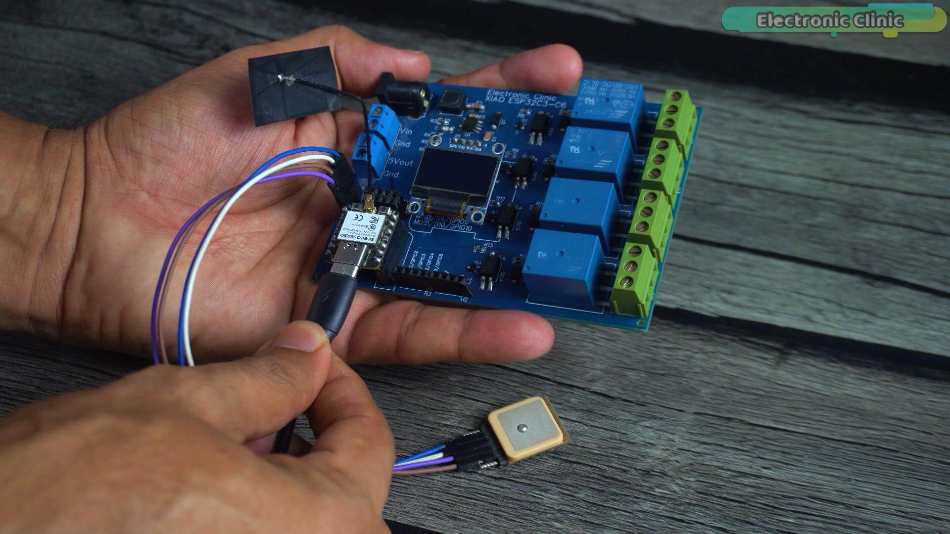 ESP32 GPS tracker carrier board assembly with GPS module and supporting components